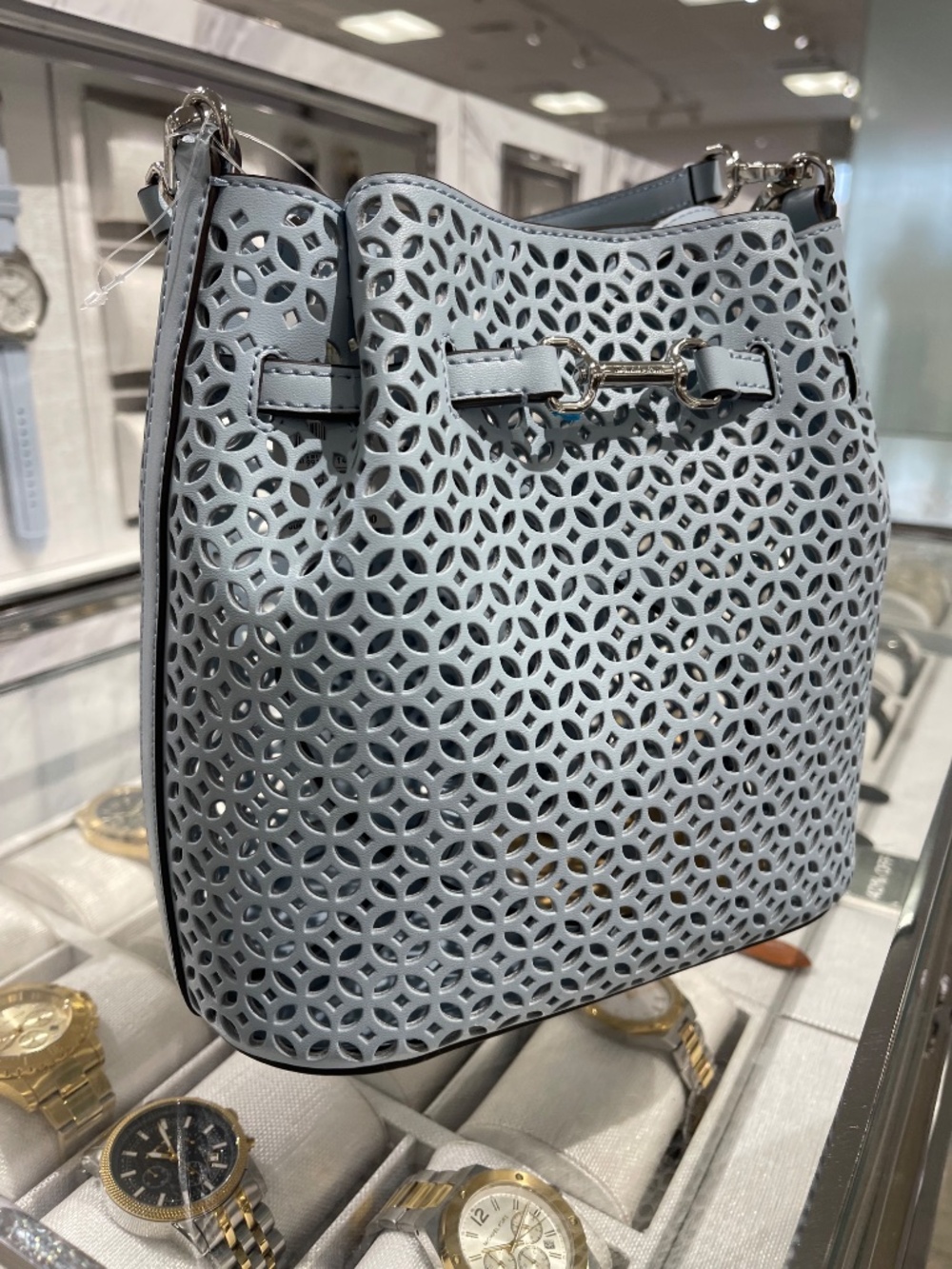 Carson Small Floral Laser Cut Bucket Crossbody Bag - Picture 13 of 16